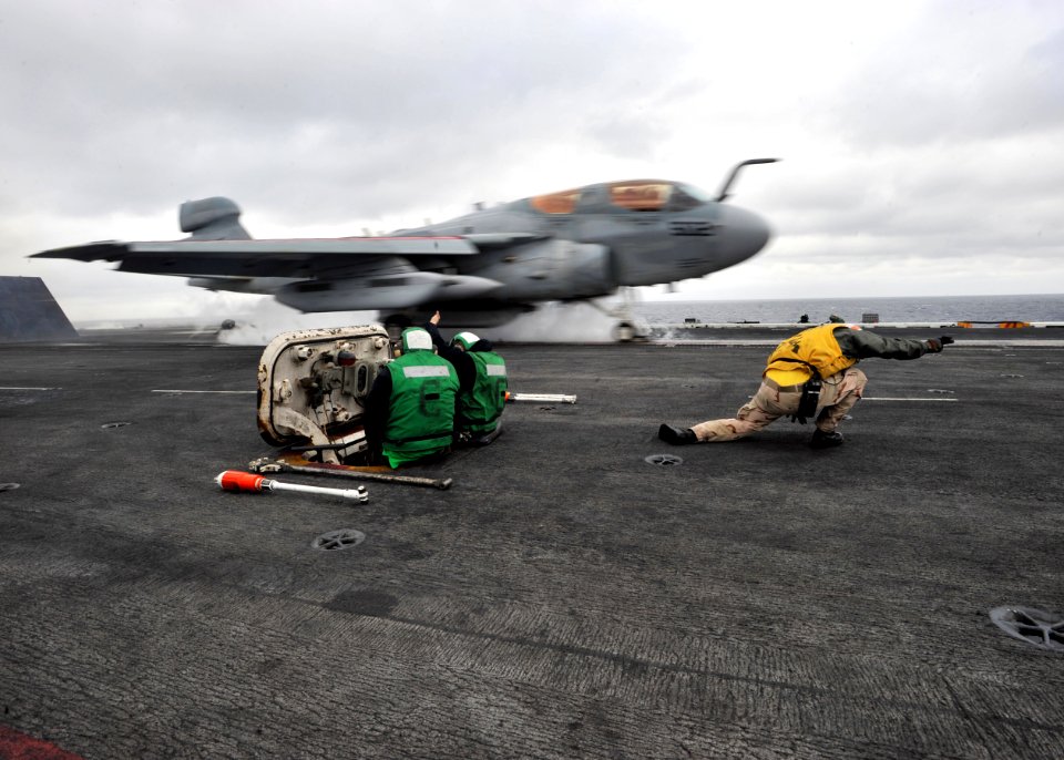 US Navy 110125-N-0569K-090 A shooter launches an EA-6B Prowler assigned to the Rooks of Electronic Attack Squadron (VAQ) 137 from the aircraft carr