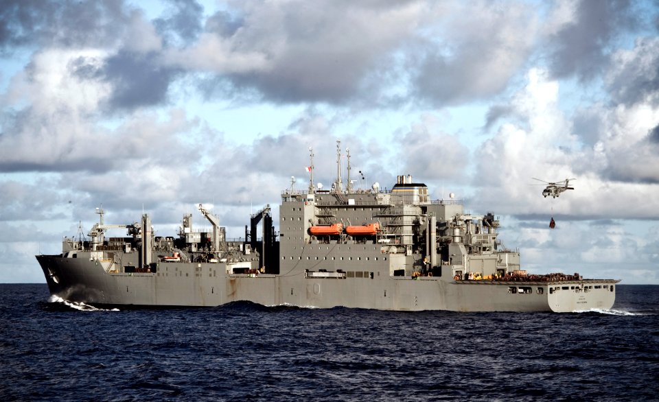 US Navy 101229-N-2055M-021 An HH-60H Sea Hawk helicopter assigned to Helicopter Anti-Submarine Squadron (HS) 15 carries a load of supplies off the