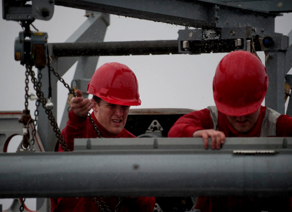 US Navy 101223-N-7981E-712 Sailors assigned to the CS-7 Division of the combat systems department aboard the aircraft carrier USS Carl Vinson (CVN