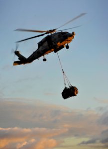 US Navy 101224-N-7981E-124 An HH-60H Sea Hawk assigned to Helicopter Anti-Submarine Squadron (HS) 15 delivers mail to the aircraft carrier USS Carl