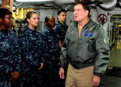 US Navy 110125-N-3178C-069 Vice Adm. Al Myers speaks to Sailors aboard USS Ronald Reagan (CVN 76) during a tour of the ship photo