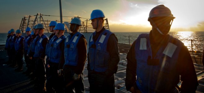 US Navy 110120-N-9589S-016 Sailors stand by during an underway replenishment aboard the Arleigh Burke-class guided-missile destroyer USS Truxtun (D photo