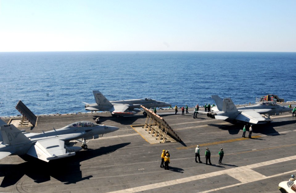 US Navy 110129-N-7004H-037 Aircraft prepare to take off from USS George H.W. Bush (CVN 77)