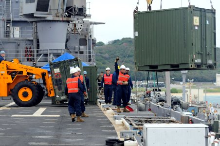 US Navy 110127-N-6692A-112 Sailors and Marines load gear and equipment assigned to the 31st Marine Expeditionary Unit (31st MEU)