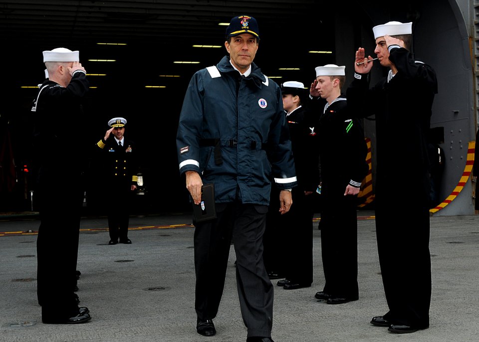 US Navy 110124-N-4743B-163 U.S. Ambassador to Japan John V. Roos departs through honor side boys after touring the forward-deployed amphibious assa