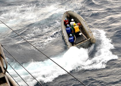 US Navy 110130-N-3620B-040 A rigid-hull inflatable boat launches from the amphibious transport dock ship USS Denver (LPD 9)