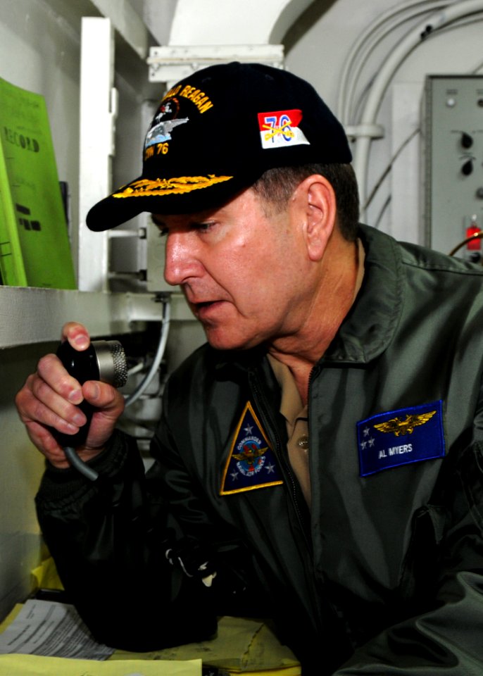 US Navy 110125-N-3178C-140 Vice Adm. Al Myers speaks to Sailors over the ship's 1MC aboard USS Ronald Reagan (CVN 76) during a tour of the ship