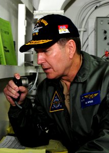US Navy 110125-N-3178C-140 Vice Adm. Al Myers speaks to Sailors over the ship's 1MC aboard USS Ronald Reagan (CVN 76) during a tour of the ship