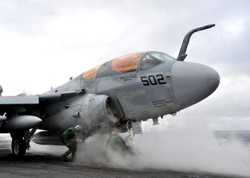 US Navy 110125-N-0569K-086 Sailors do final pre-flight checks on a EA-6B Prowler aboard USS Enterprise (CVN 65)