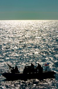 US Navy 110128-N-9589S-274 The visit, board, search and seizure team assigned to USS Truxtun (DDG 103) conducts a training exercise photo