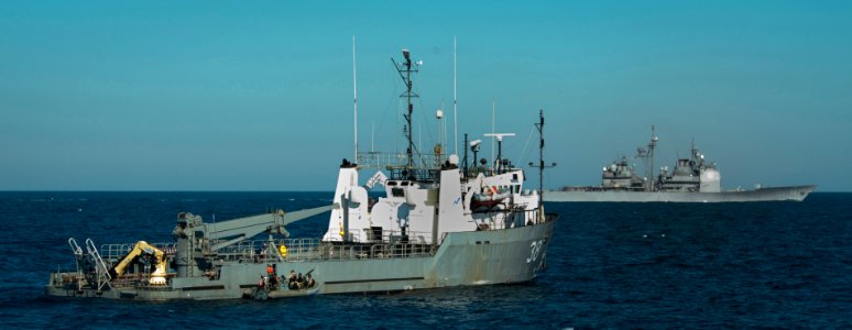 US Navy 110128-N-9589S-293 The visit, board, search and seizure team assigned to USS Truxtun (DDG 103) prepares to board a vessel as USS Monterey ( photo