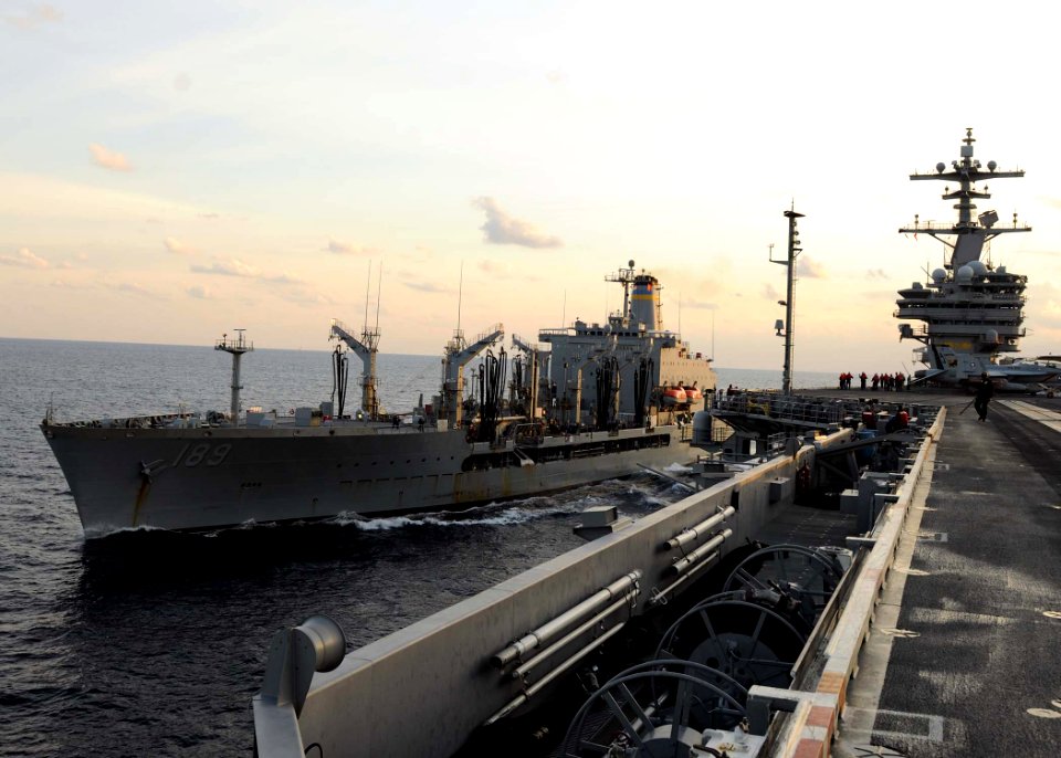 US Navy 110130-N-3374C-129 The Military Sealift Command fleet replenishment oiler USNS John Lenthall (T-AO 189) pulls alongside the aircraft carrie