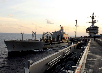 US Navy 110130-N-3374C-129 The Military Sealift Command fleet replenishment oiler USNS John Lenthall (T-AO 189) pulls alongside the aircraft carrie
