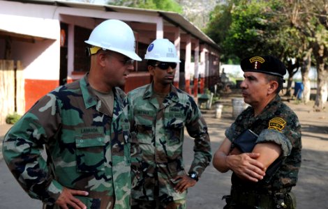 US Navy 110124-N-7589W-140 Sailors speak with Guatemalan army civil affairs commander Col. Cesar Ruiz about construction plans for a Southeast Asia