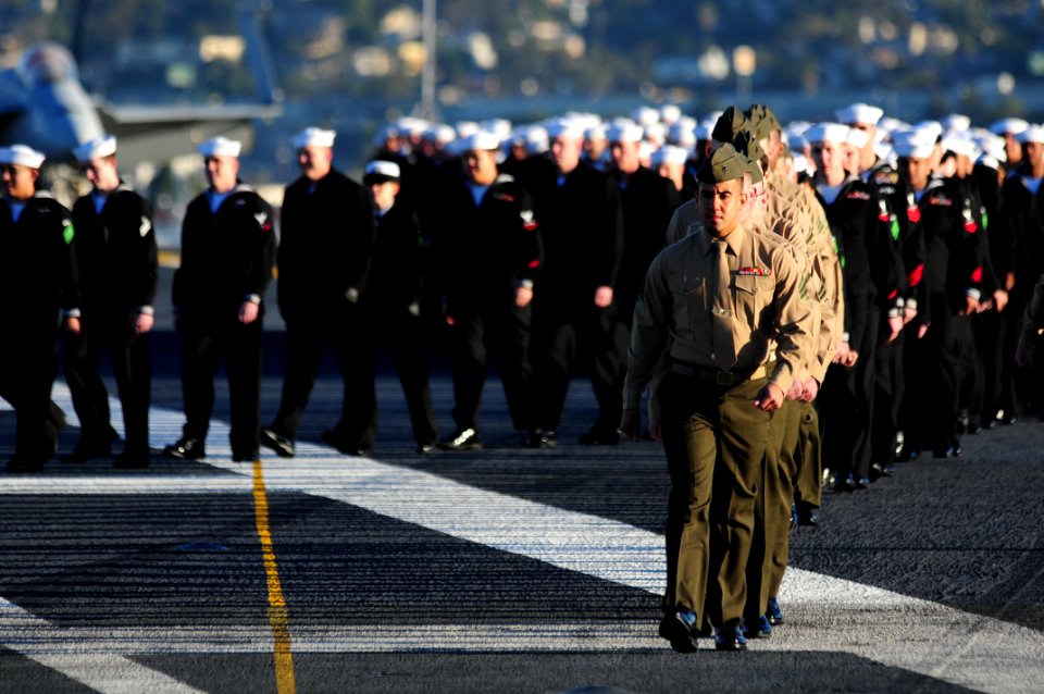 US Navy 110202-N-5503T-018 Sailors and Marines assigned to the aircraft carrier USS Ronald Reagan (CVN 76) and embarked Carrier Air Wing (CVW) 14 p