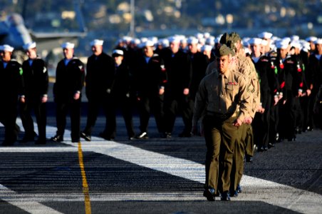 US Navy 110202-N-5503T-018 Sailors and Marines assigned to the aircraft carrier USS Ronald Reagan (CVN 76) and embarked Carrier Air Wing (CVW) 14 p