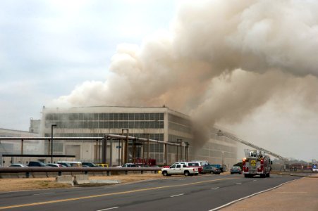 US Navy 110127-N-5319A-021 Firefighters work to put out a warehouse fire at Naval Station Norfolk