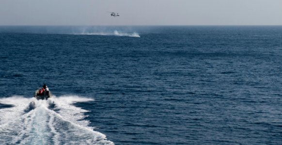 US Navy 110204-N-7488A-299 Sailors assigned to the deck department of the Nimitz-class aircraft carrier USS Carl Vinson (CVN 70) respond to a Sailo