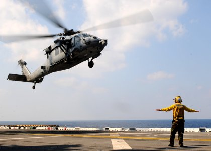 US Navy 110201-N-4743B-345 An MH-60S Sea Hawk helicopter lands aboard USS Essex (LHD 2)