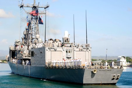 US Navy 110201-N-7498L-326 Sailors man the rails as USS Reuben James (FFG 57) departs for deployment