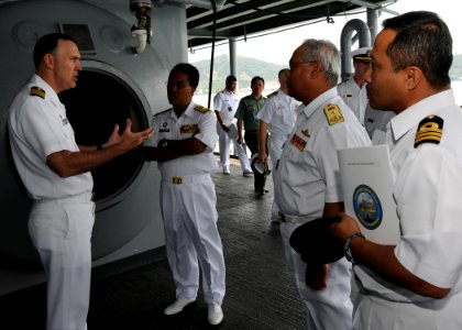 US Navy 110201-N-5620H-131 Capt. Thomas Stanley explains to Royal Malaysian navy First Adm. Anuwi and First Adm. Rosland, uses for the ship's dive