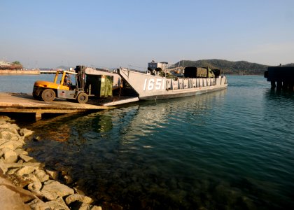 US Navy 110208-N-4743B-326 A landing craft utility offloads Marines and equipment at Sattahip Naval Base to take part in exercise Cobra Gold 2011 photo