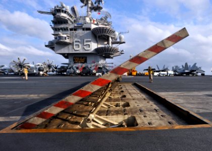 US Navy 110204-N-0569K-021 A jet blast deflector is lowered following flight operations aboard USS Enterprise (CVN 65)