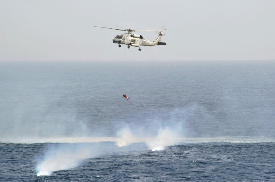 US Navy 110204-N-7981E-177 deploys to recover a Sailor who went overboard from USS Carl Vinson (CVN 70)