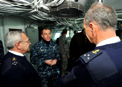 US Navy 110204-N-0569K-002 Rear Adm. Terry B. Kraft speaks with Vice Adm. Benoit Chomel de Jarnieu, left, and Rear Adm. (Upper Half) Xavier Magne i