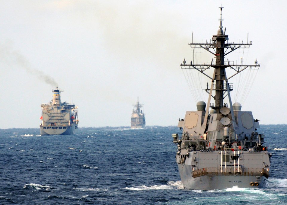 US Navy 110209-N-9793B-013 USS Truxton (DDG 103), right, USS Monterey (CG 61), center, and USNS John Lenthall (T-AO 189) perform a straits transit