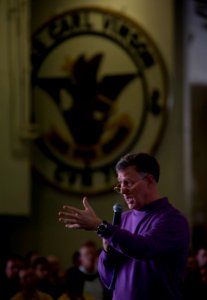 US Navy 110211-N-7981E-144 Capt. Bruce H. Lindsey, commanding officer of the aircraft carrier USS Carl Vinson (CVN 70), addresses the crew during a