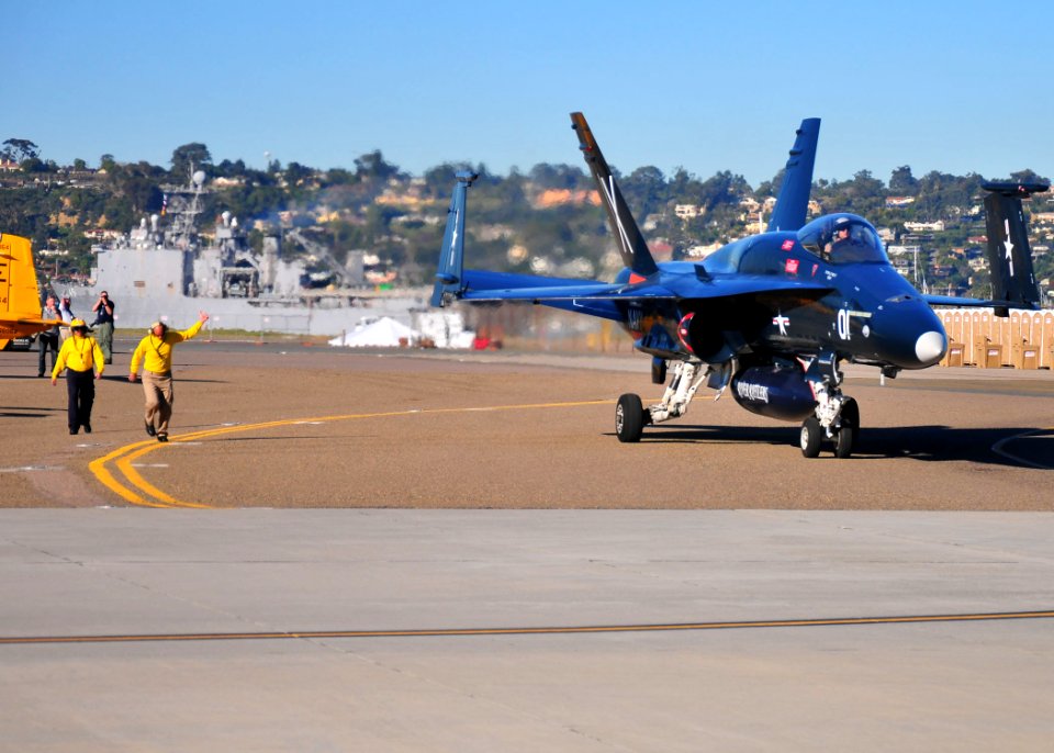 US Navy 110211-N-ZS026-063 An F-A-18 Hornet strike fighter taxis across the flight line at Naval Air Station North Island