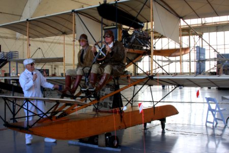 US Navy 110212-N-3446M-157 Reenactors Ben Miller and Scott Steele dress in period aviation uniforms and pose with the A-1Triad seaplane
