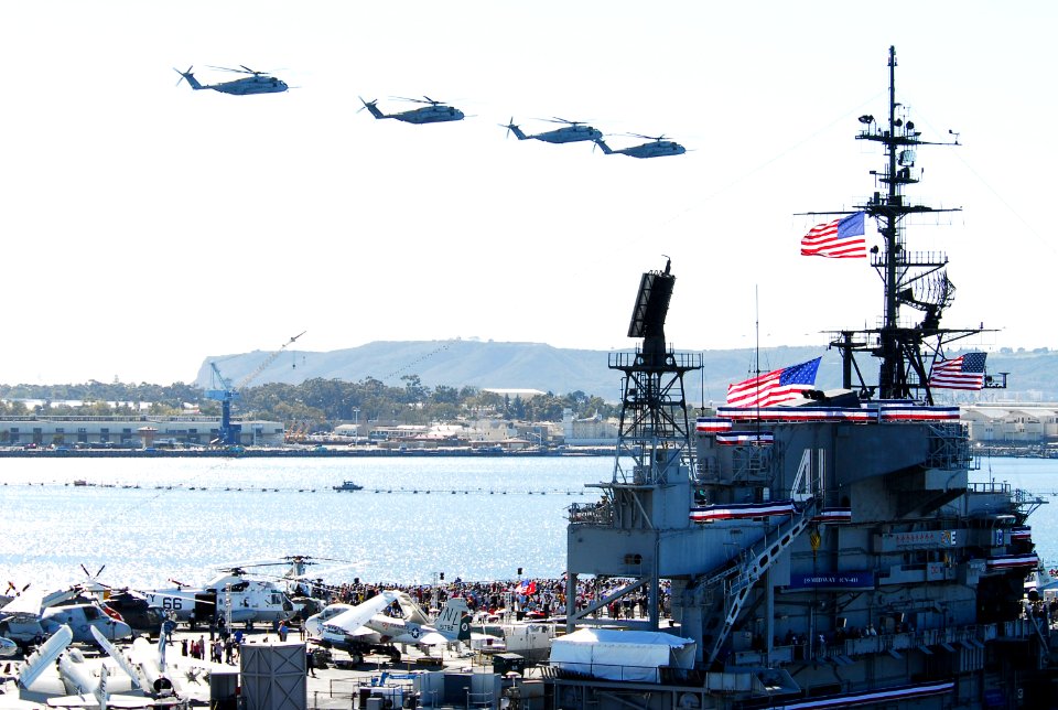 US Navy 110212-N-4378P-383 A formation of helicopters fly over San Diego Bay during the Centennial of Naval Aviation Open House and Parade of Fligh