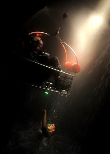 US Navy 110210-N-1810F-019 A student at the Aviation Survival Training Center ascends on a hoist during a simulated night exercise as part of an ai