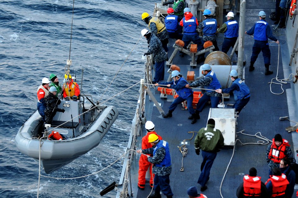 US Navy 110209-N-9818V-306 Sailors aboard the guided-missile destroyer USS Fitzgerald (DDG 62) participate in a man overboard drill