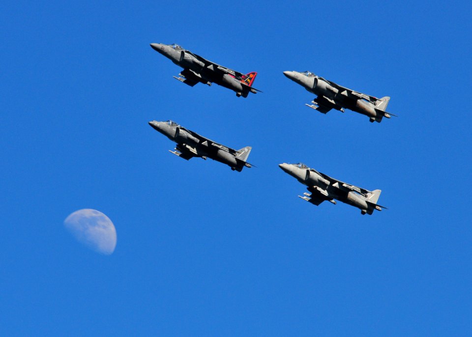 US Navy 110212-N-ZS026-188 AV-8B Harriers fly by the moon over San Diego Bay during the Centennial of Naval Aviation Open House and Parade of Fligh
