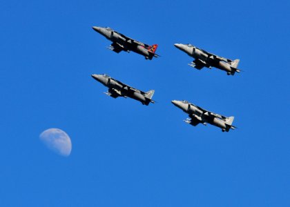 US Navy 110212-N-ZS026-188 AV-8B Harriers fly by the moon over San Diego Bay during the Centennial of Naval Aviation Open House and Parade of Fligh