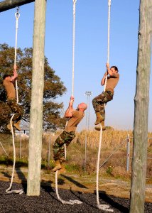 US Navy 110211-N-AW868-056 Seabees assigned to Alfa Company of Naval Mobile Construction (NMCB) 74 attempt the Marine Corps obstacle course at Nava
