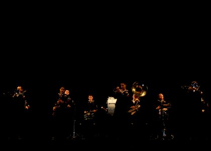 US Navy 110211-N-MU720-011 The U.S. 7th Fleet Orient Express Brass band conducts a sound check in the Kanagawa Prefecture Assembly Hall before a pe