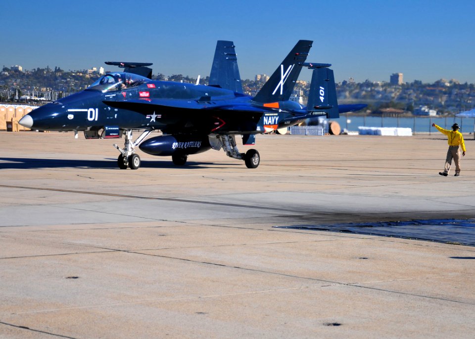 US Navy 110211-N-ZS026-139 An F-A-18 Hornet strike fighter taxis across the flight line at Naval Air Station North Island