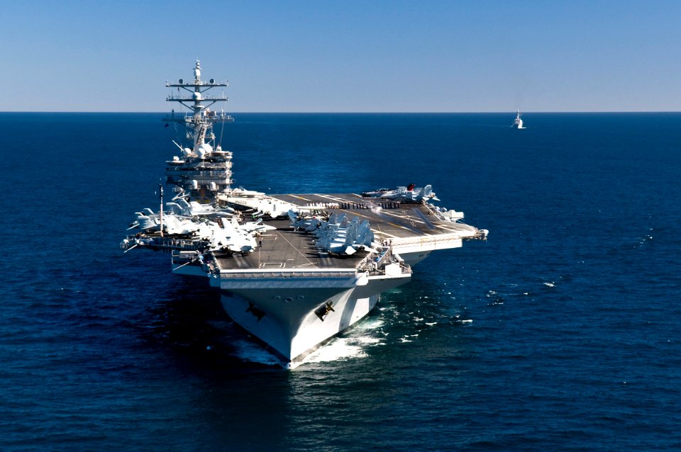 US Navy 110210-N-IC111-106 The aircraft carrier USS Ronald Reagan (CVN 76) is underway in the Pacific Ocean with the Arleigh Burke-class guided-mis