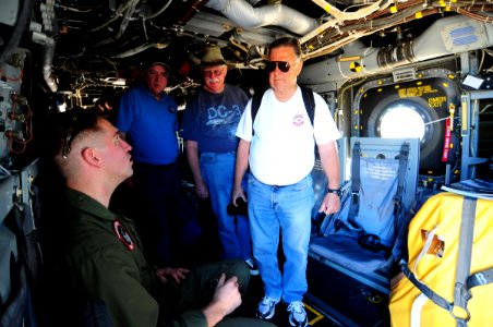 US Navy 110212-N-3659B-054 Marine Capt. Geoff Blumenfeld explains the interior of a MV-22 Osprey assigned to the Sea Elks of Marine Tilt Rotor Squa
