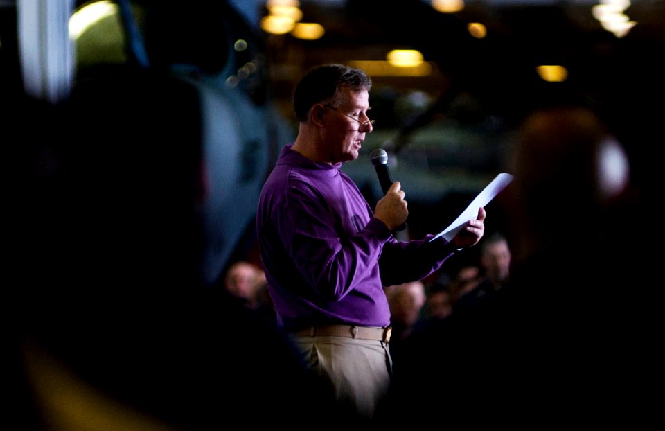 US Navy 110211-N-2055M-080 Capt. Bruce H. Lindsey, commanding officer of the aircraft carrier USS Carl Vinson (CVN 70), addresses the crew during a