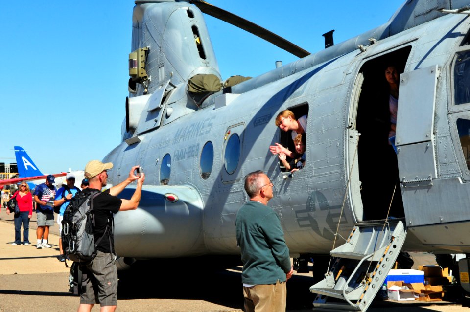 US Navy 110212-N-5681S-256 Visitors look at aircraft displays during the Centennial of Naval Aviation Open House and Parade of Flight at Naval Air