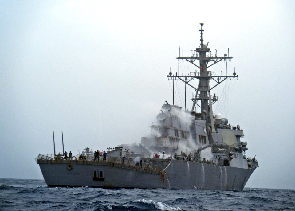 US Navy 110215-N-XO436-093 The Arleigh Burke-class guided-missile destroyer USS Barry (DDG 52) conducts an operational check of the countermeasure