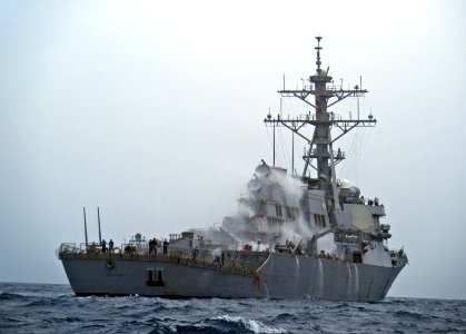 US Navy 110215-N-XO436-093 The Arleigh Burke-class guided-missile destroyer USS Barry (DDG 52) conducts an operational check of the countermeasure