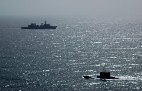 US Navy 110217-O-0000X-033 NATO ships and aircraft force the Greek navy submarine HS Protefs (S 113) to surface off the coast of Sicily during Exer