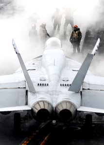 US Navy 110216-N-DM338-313 An F-A-18E Super Hornet assigned to the Argonauts of Strike Fighter Squadron (VFA) 147 moves into position to catapult f