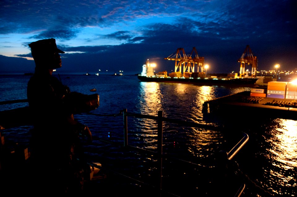 US Navy 110213-N-5758H-054 Ship's Serviceman Seaman Demarquis Holman stands the force protection watch aboard the U.S. 7th Fleet command ship USS B